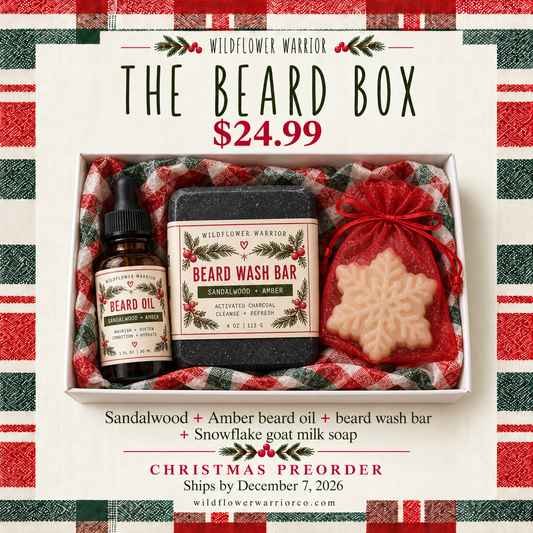 The Beard Box Christmas gift with Sandalwood and Amber beard oil, beard wash bar and snowflake goat milk soap in a red mesh bag