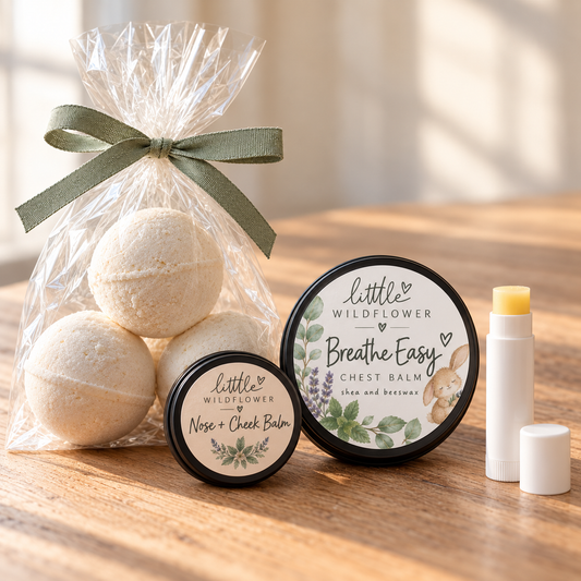 Bundle mockup with three round bath bombs, chest balm, nose and cheek balm, and lip balm