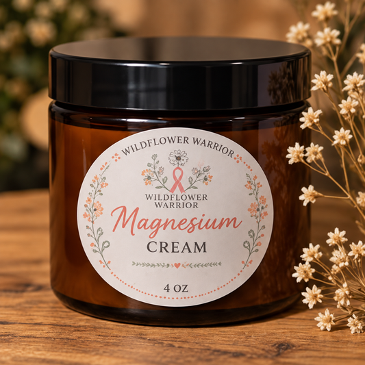 Wildflower Warrior magnesium cream in an amber jar with a black lid beside dried flowers